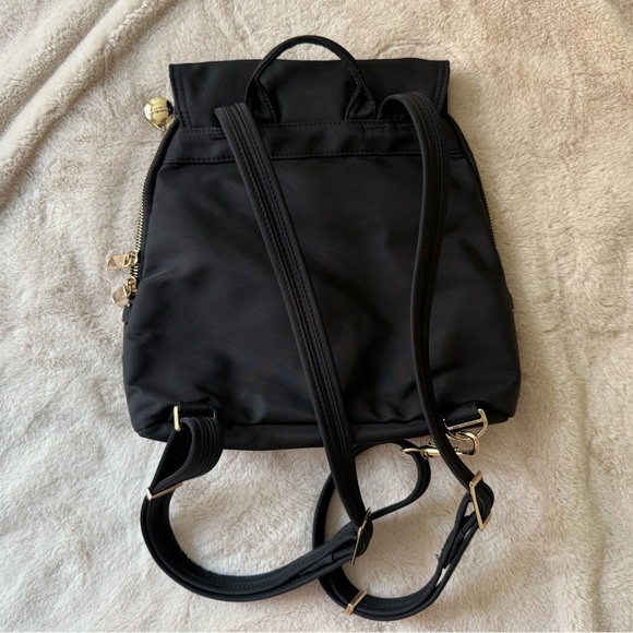 Travelon Anti-Theft Small Tailorer Backpack Black with Magenta Lining - Picture 7 of 11